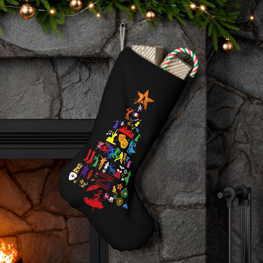 Musical Theatre Icon Christmas Tree Stocking in black faux suede, hanging on a fireplace, featuring a festive design with theatre symbols.