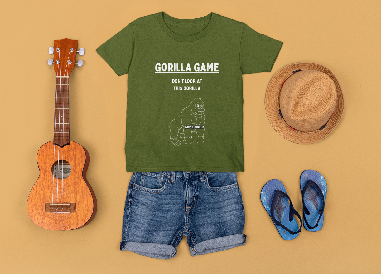 The Game Kids Gorilla T-shirt. Fun playful tee in black, khaki green and royal blue