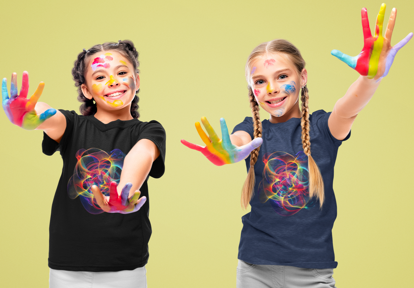 The young girls wearing a blue and black fractal Chaos Maths T-Shirt design.  The girls have their hands outstretched and their hands are covered in paint to match the design on the T-Shirt